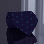 Aeroplane Tie Dark Blue Repeating Planes<br><div class="desc">Add a touch of aviation elegance to your wardrobe with this refined deep blue tie, featuring a subtle pattern of small aeroplanes. Designed with discerning pilots and aerospace professionals in mind, this tie blends classic style with a nod to your passion for flight. The understated colour palette makes it a...</div>