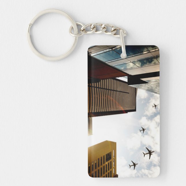Aeroplanes flying over buildings key ring (Front)