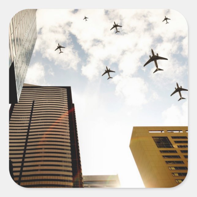 Aeroplanes flying over buildings square sticker (Front)