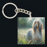 Afghan Hound In Floral Meadow Art Key Ring<br><div class="desc">This nature-themed keychain features a majestic Afghan Hound dog captured in an ethereal oil painting style, standing gracefully in a sunlit meadow filled with wildflowers and soft grasses. The elegant canine’s flowing coat and regal stance evoke sophistication and serenity, making this keychain perfect for dog lovers, art enthusiasts, and those...</div>