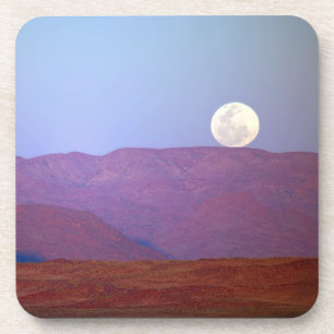 Africa, Namibia, Sossusvlei. A full moon rests Coaster