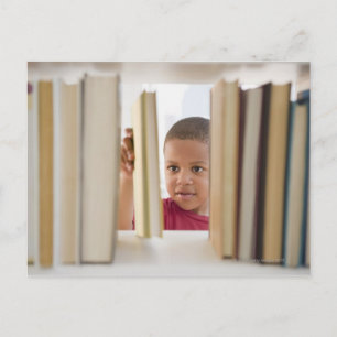 African American boy selecting book Postcard