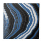 Agate effect, black, white and blue ceramic tile<br><div class="desc">This striking marble effect tile showcases a bold digital agate design with flowing swirls of blue, black, and white, creating a dynamic and contemporary appearance. It is an excellent choice for modern bathrooms or as a standout accent in a boyish bedroom. The abstract pattern and geode- nspired lines add rich...</div>