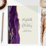 Agate Geode Purple Gold Ivory Wedding Plans Planner<br><div class="desc">This elegant modern wedding planner features a purple watercolor design trimmed with faux gold glitter. Easily customise the charcoal grey text on an ivory background, with the names of the bride and groom in handwriting calligraphy over a large ampersand. Add the title and wedding date below in italics. The back...</div>