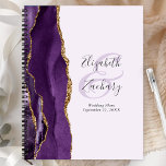 Agate Geode Purple Gold Lavender Wedding Plans Planner<br><div class="desc">This elegant modern wedding planner features a purple watercolor design trimmed with faux gold glitter. Easily customise the charcoal grey text on a pale lavender background, with the names of the bride and groom in handwriting calligraphy over a large ampersand. Add the title and wedding date below in italics. The...</div>