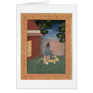 Aged ascetic seated on a tiger skin outside a buil
