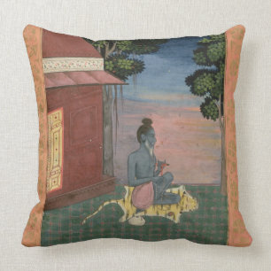 Aged ascetic seated on a tiger skin outside a buil cushion