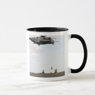 Air Force pararescuemen conduct a combat insert Mug