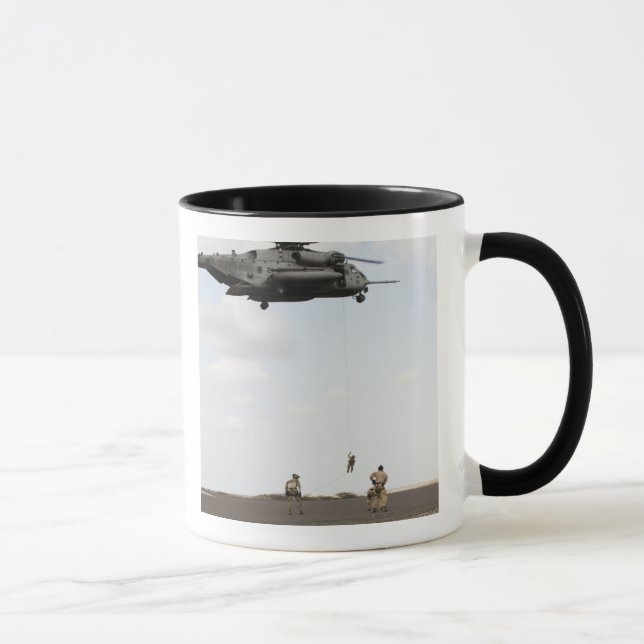 Air Force pararescuemen conduct a combat insert Mug (Right)