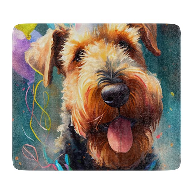 Airedale dog with birthday hat and balloons cutting board (Front)