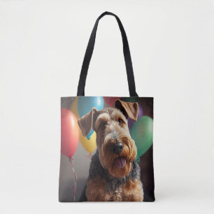 Airedale dog with cake and balloons tote bag