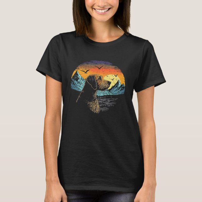Airedale Terrier Dog and Sun Rising Over Mountains T-Shirt (Front)