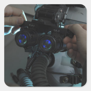 Airman adjusts the eyespan square sticker