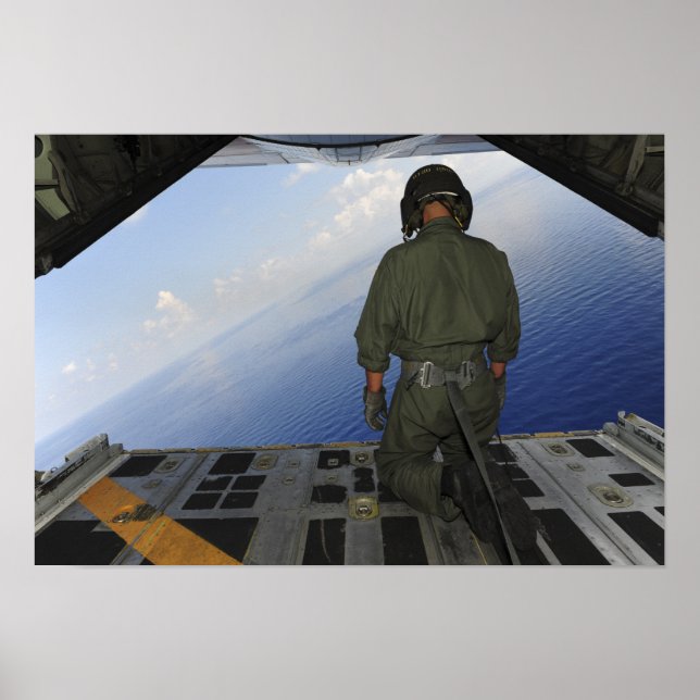 Airman observes the waters of the Gulf of Mexic Poster (Front)