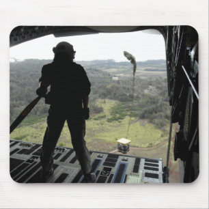 Airman watches a practice bundle fall mouse pad
