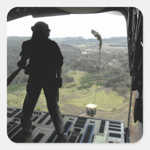 Airman watches a practice bundle fall square sticker