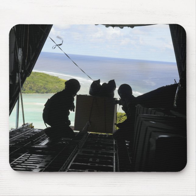Airmen push out a pallet of donated goods mouse pad (Front)