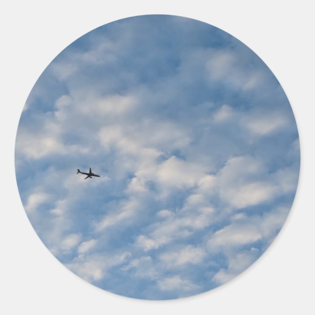 Airplane Crossing a Cloud-Filled Blue Sky Classic Round Sticker (Front)