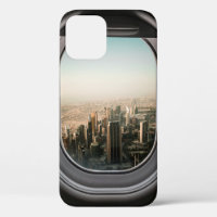 AIRPLANE WINDOW VIEW OF CITY DURING DAYTIME