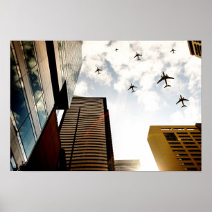 Airplanes flying over buildings poster