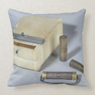 Alabaster box and bronze and silver seal cylinders cushion