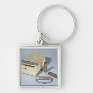 Alabaster box and bronze and silver seal cylinders key ring