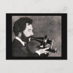 Alexander Graham Bell Postcard<br><div class="desc">Alexander Graham Bell speaks into a prototype telephone.</div>