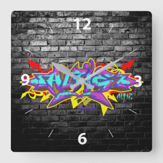 Alfie in graffiti lettering with grey bricks square wall clock