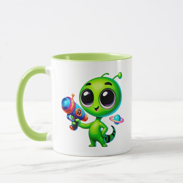 Alien cute with a laser gun and planet mug (Left)