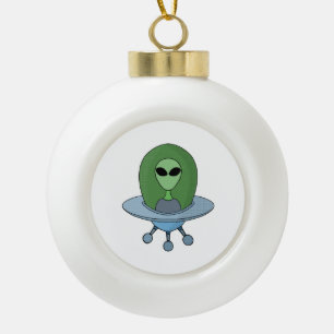 Alien in his little spaceship ceramic ball christmas ornament