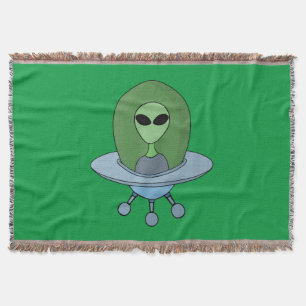 Alien in his little spaceship throw blanket