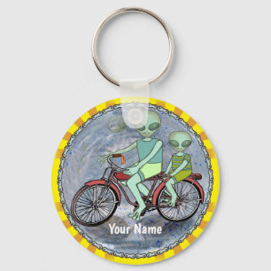 Alien Riding Bike keychain