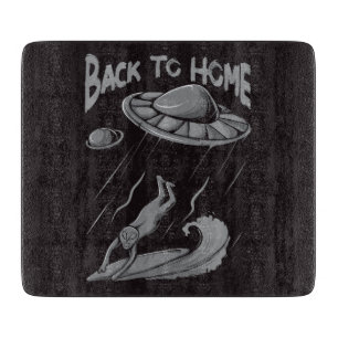 alien ufo surfing illustration with back to home cutting board
