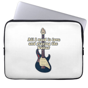 All i need is love and playing the guitar. funny laptop sleeve