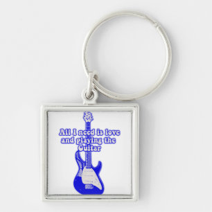All i need is love and playing the guitar key ring