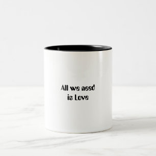 'All we need is Love' written mug. Two-Tone Coffee Mug