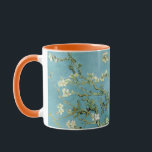Almond blossom by Vincent Van Gogh Mug<br><div class="desc">Large blossom branches like this against a blue sky were one of Van Gogh’s favourite subjects. Almond trees flower early in the spring making them a symbol of new life. Van Gogh borrowed the subject, the bold outlines and the positioning of the tree in the picture plane from Japanese printmaking....</div>