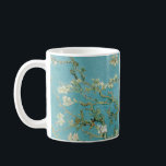 Almond Blossoms by Vincent van Gogh Coffee Mug<br><div class="desc">Almond Blossoms from is a group of several paintings made in 1888 and 1890 by Vincent van Gogh in Arles and Saint-Rémy, southern France of blossoming almond trees. Flowering trees were special to Van Gogh. They represented awakening and hope. He enjoyed them aesthetically and found joy in painting flowering trees....</div>