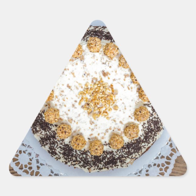 Almond nut cake on rustic wood triangle sticker (Front)