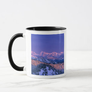 Alpenglow strikes the peaks of Glacier Mug