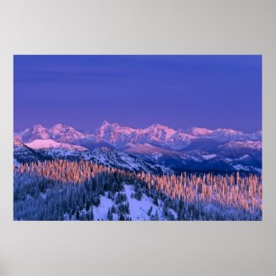 Alpenglow strikes the peaks of Glacier Poster
