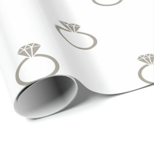 Aluminium Silver Grey Engagement Rings on White Wrapping Paper