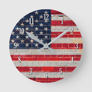 America flag on a brick wall round clock