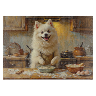 American Eskimo Dog Cooking in Kitchen Cutting Board