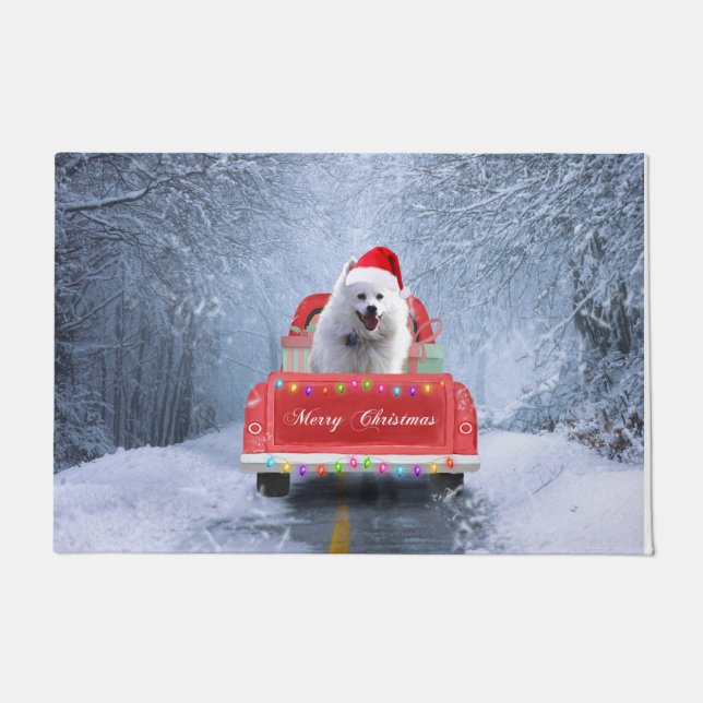 American Eskimo Dog in Snow sitting in Christmas  Doormat (Front)
