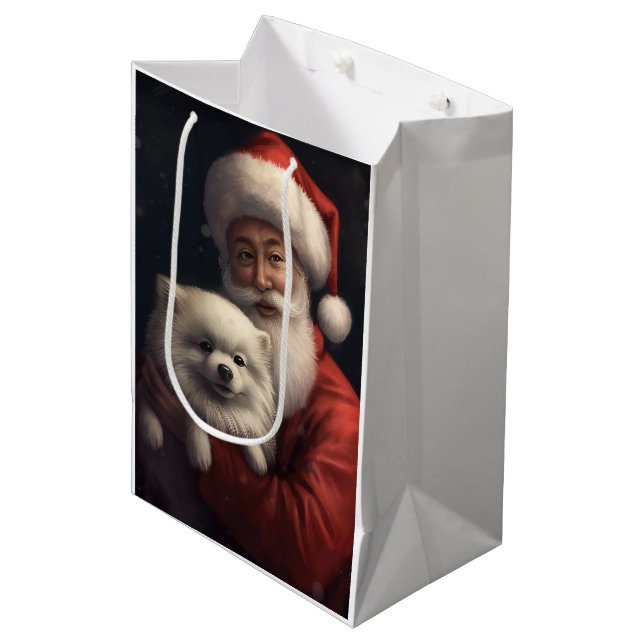 American Eskimo with Santa Claus Festive Christmas Medium Gift Bag (Front Angled)
