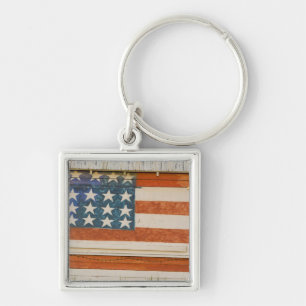American flag painted onto fireworks stand near key ring