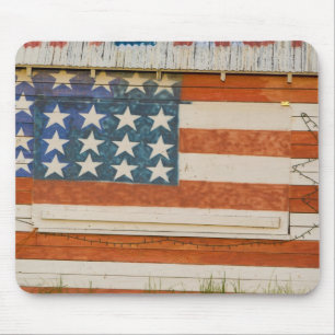 American flag painted onto fireworks stand near mouse pad