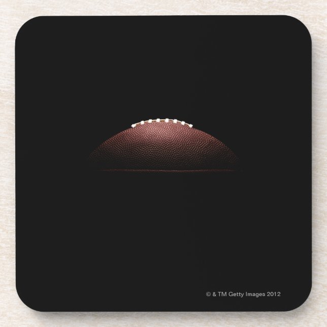 American football ball on black background coaster (Front)
