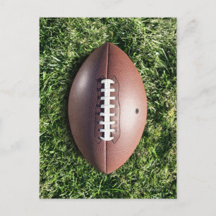 American football on grass postcard
